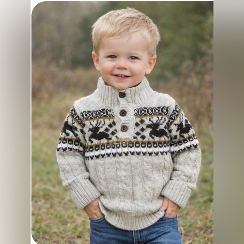 Baby Boy sweater with ornaments.